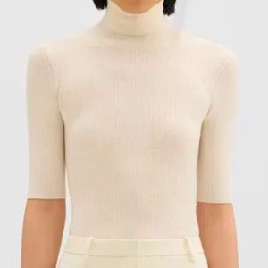 Theory’s  merino wool sweater perfectly stylish as you, shapes, warmth